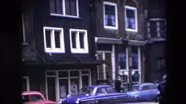 Amsterdam Netherlands (1967): A Look At A Building On The Busy Streets In The City