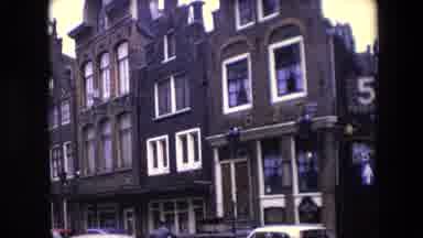 Amsterdam Netherlands-1967: Row Of Canal Houses Perpendicular To A Narrow Alley