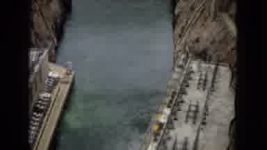 Arizona (1967): Atop A Dam Looking At The Water And Mountains From Afar