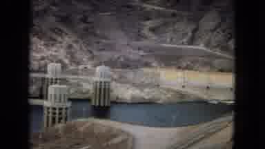 Arizona (1967): Dam Can Be Seen In The Middle Of A Great Valley On A Cloudy Day