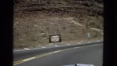 Arizona (1967): Man Driving Vehicle In Desert