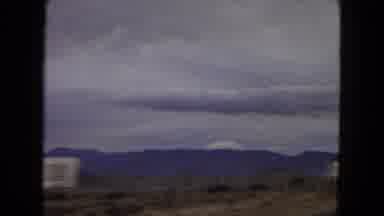 Arizona (1967): Traveling Down The Road In A Vehicle