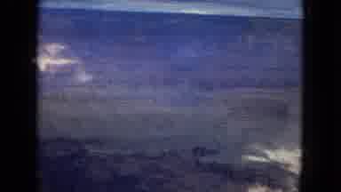 Arizona-1967: Grand Canyon Aerial Views with Cloudy Skies and Dramatic Cliffs