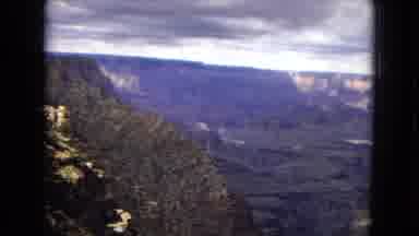 Arizona (1967): A Forest That Fades Into A Mountainous Terrain.