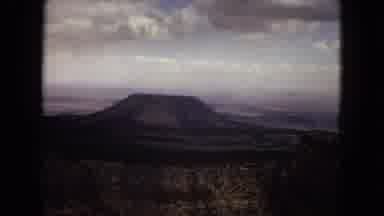 Arizona (1967): Beautiful Mountain Ranges Viewed From Afar And An Old Stone Tower