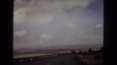 Arizona (1967): Driving Across Desert Stopping At Restaurant To Eat Food Along The