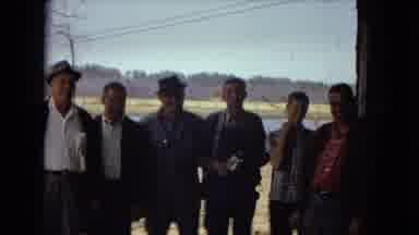 Arizona (1967): Five Males Standing Near A Field Laughing And Talking By An Open