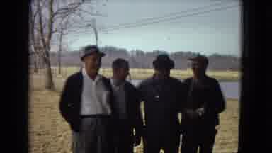 Arizona-1967: Men Standing Outside and Making Food Inside Cabin