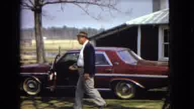Arizona (1967): Man With A Hat Walking Around A Lush Farm