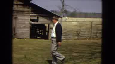 Arizona (1967): Man Walks On Abandoned Farm Past Barn And House
