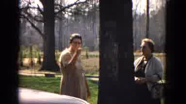 Arizona (1967): A Lady Points At The Camera While Talking Outdoors.
