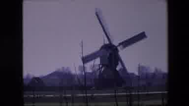 Brussels Belgium (1967): Farm Windmill Blowing In The Distance At A Repetitive