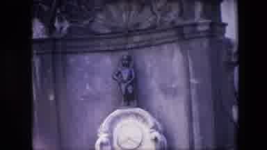 Brussels Belgium (1967): A Stone Cupid Statue.