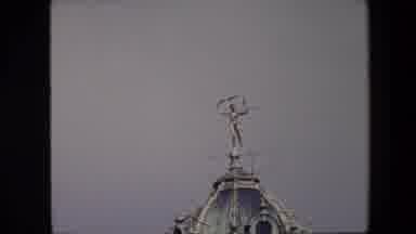 Brussels Belgium (1967): A Statue Of A Greek God On Top Of A Steeple.