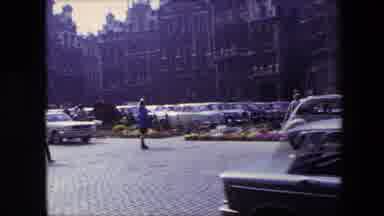 Brussels Belgium (1967): Man Smoking Cigarette Hurrying In Busy City Toward Car