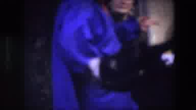 Brussels Belgium (1967): Person In Dress Pointing And Speaking With A Woman