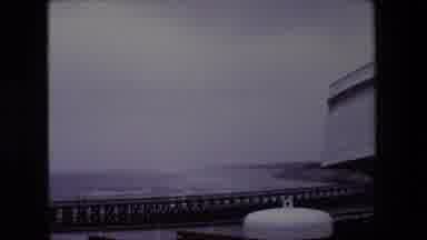 Calais France (1967): Ocean Waves Hitting The Shore On A Windy Day Under A Cloudy