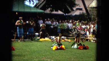 1967: Honolulu Hawaii. Women Hula Dancing With Band Playing Behind Them.
