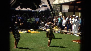 1967:HONOLULU HAWAII. Some Women Hula Dancing While A Band Plays Behind Them.