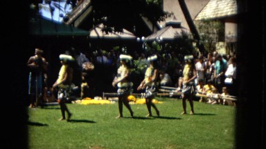 1967:HONOLULU HAWAII. Some Women Hula Dancing While A Band Plays Behind Them.