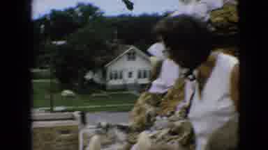 Iowa USA (1967): Woman And Man Looking Down From Rock Formation