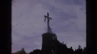 Iowa USA (1967): Tourists Viewing Landmarks Including Large Hanging Cross Statue