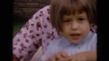 Iowa USA (1967): Girl And Mother Talk To Each Other While Girl Eats