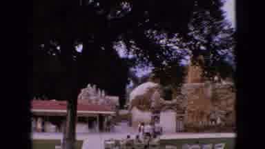 Iowa USA (1967): Woman Family In Seats Socializing Beside Tall Trees Lawn Pavilion
