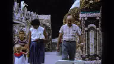 Iowa USA (1967): Pocket Protector Man With Watch Walks Near Woman Holding Girls