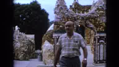 Iowa USA (1967): A Middle Aged Man With A Beige And White Shirt Walking He Is Bald