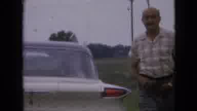 Iowa USA (1967): Man Walking Around Car Hip Thrusting