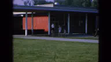 Iowa USA (1967): Young Children On Sidewalk In Between Classes At School
