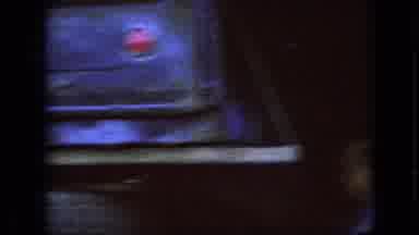 Iowa USA (1967): Dark Storefront And A Woman In The Bright Daylight Walking