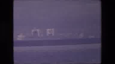 London England (1967): A Big Size Boat Cruising On A Decent Body Of Water