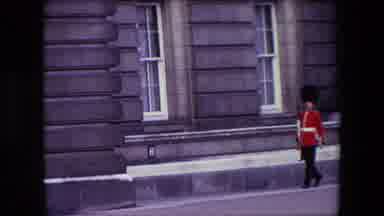 London England (1967): British Soldier Marching Outside Near Building