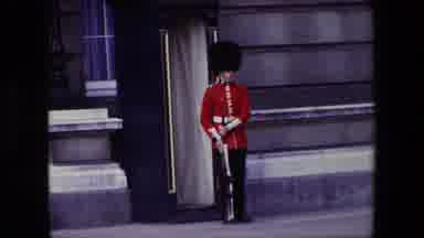 London England (1967): Queens Guard Standing And Marching In Front Of A Building