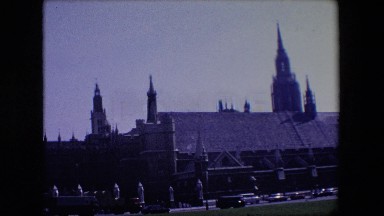 London England (1967): Heavy Vehicle Traffic Near Ancient Cathedral,Clock Tower,