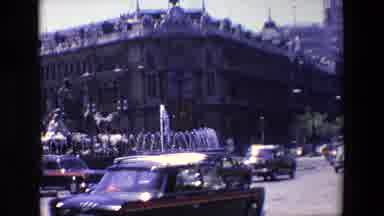 Madrid Spain (1967): Vehicles Driving Down The Street Passing An Important