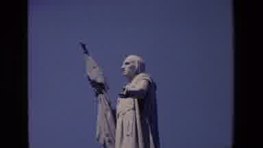 Madrid Spain (1967): Large Stone Statue Of Religious Saint Figure Against A Blue