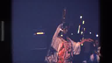 Palermo Italy (1967): Woman Dances And Entertains An Audience While Balancing A