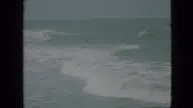 Branson Missouri USA (1968): Woman Leaving Beach As Storm Approaches