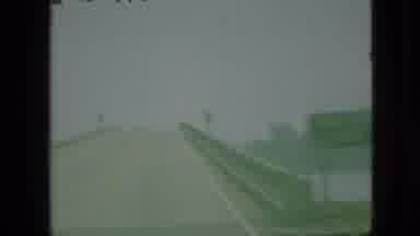 Branson Missouri USA-1968: Car In Motion Going Towards A Bridge With Storm