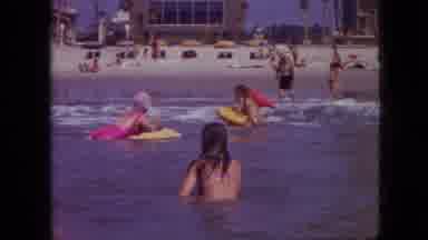 Branson Missouri USA (1968): Vacationers Frolicking In The Ocean At The Shore On A