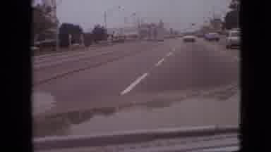 Branson Missouri USA (1968): Car Driving Into Different Lane In Traffic Near Other