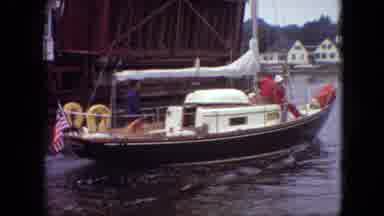 Branson Missouri USA (1968): Boat With Its Sail Down Passes Under Bridge