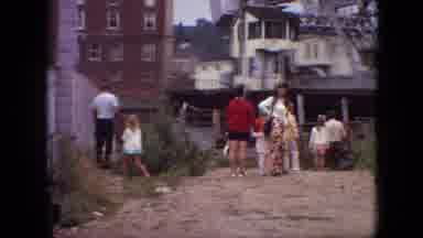 Branson Missouri USA (1968): A Family Standing Outside Buildings,A Structure And A