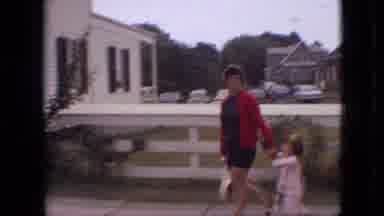 Branson Missouri USA (1968): Women Walking Child Rainy Day Trip Around Town People