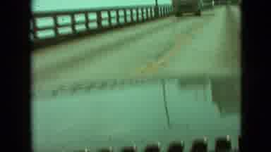 Branson Missouri USA (1968): Vehicles Pass One Another On A Bridge With A Railing