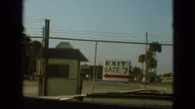 Branson Missouri USA (1968): Gated Fence Exit Sign Guardhouse Daylight Driving Car