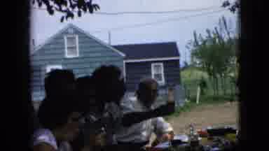 California USA (1969): There Is A Family Eating Outside With A Table Filled With